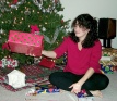 1999-12-22-Suzi-handing-out-gifts.jpg